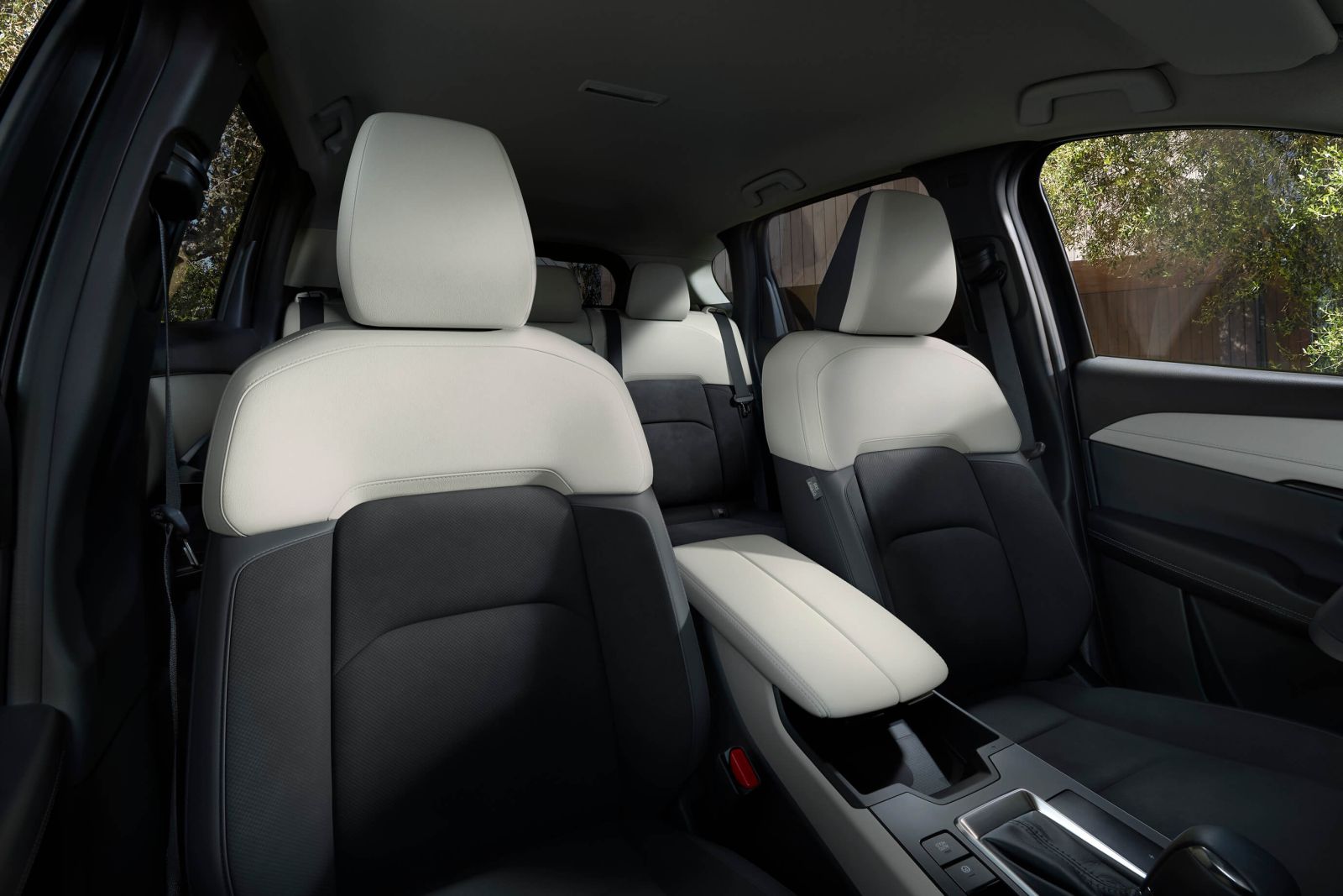 Looking toward the rear seats of the 2026 Mazda CX-5 from the passenger side, showcasing interior space.