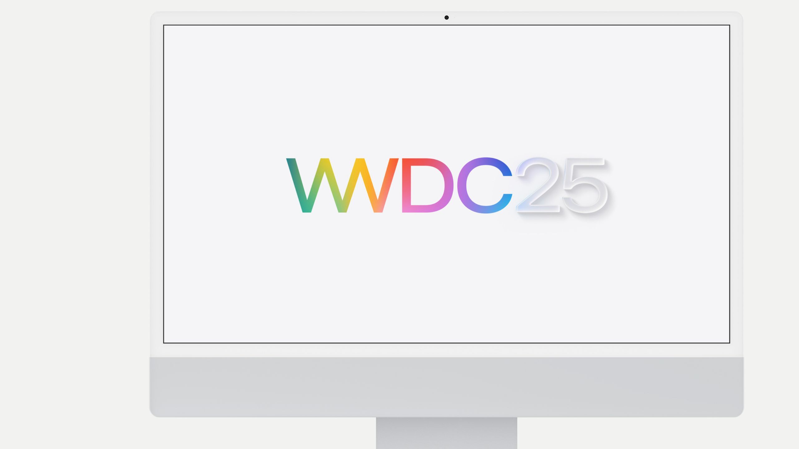 Apple WWDC 2025 keynote stage showing Apple Intelligence and platform announcements with developers in attendance.